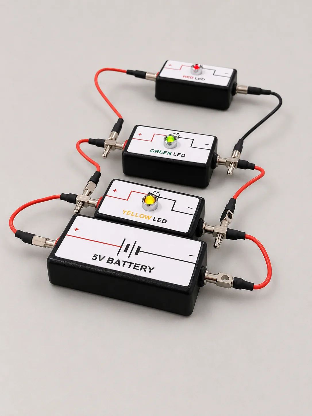 A 5V battery powering red, green and yellow LED modules connected in a parallel circuit